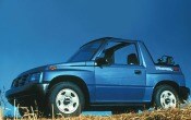 1996 Geo Tracker 2 Dr STD 4WD Convertible Shown