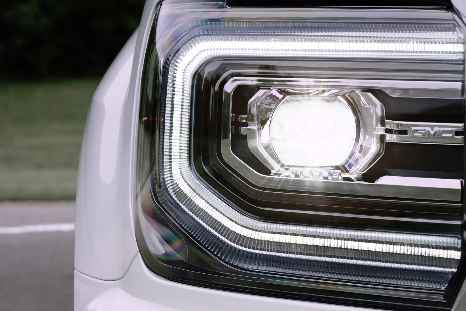 2016 GMC Sierra 1500 SLT Crew Cab Pickup Headlamp Detail