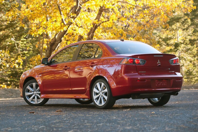  vs 2015 Mitsubishi Lancer models side by side  serving Houston, TX