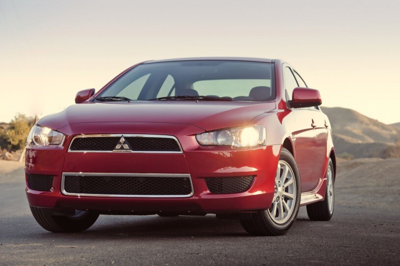  vs 2014 Mitsubishi Lancer models side by side  serving Houston, TX
