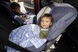 Two Children in Child-Safety Seats