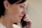 Cautious Woman on Phone Cautious Woman on Phone