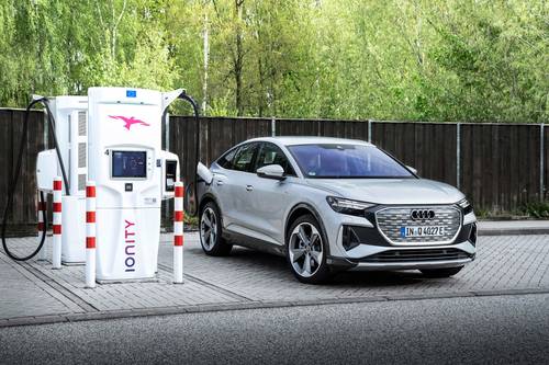 2025 Audi Q4 Sportback e-tron Prestige 4dr SUV Lifestyle Exterior. European Model Shown.