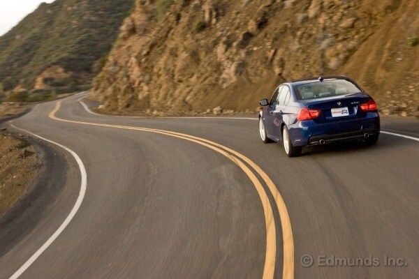 2010 BMW 335i vs. 2010 Mitsubishi Lancer Evolution MR Touring