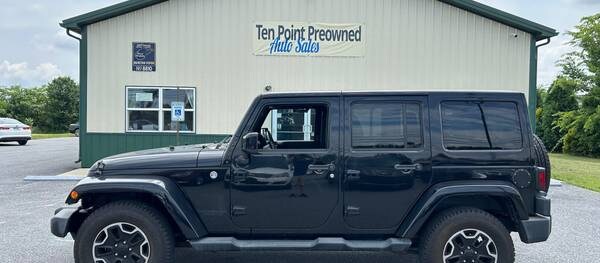 Jeep Wrangler 2014 Unlimited Sahara 4dr SUV 4WD (3.6L 6cyl 6M)