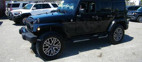 Jeep Wrangler 2014 Unlimited Sahara 4dr SUV 4WD (3.6L 6cyl 6M)