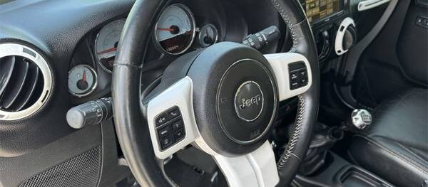 Jeep Wrangler 2014 Unlimited Sahara 4dr SUV 4WD (3.6L 6cyl 6M)