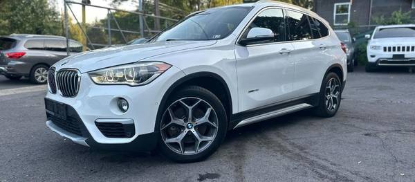 BMW X1 2016 xDrive28i 4dr SUV AWD (2.0L 4cyl Turbo 8A)