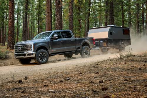 Ford F-250 Super Duty Lariat Crew Cab Pickup Lifestyle Exterior. Tremor Off-Road Package Shown.