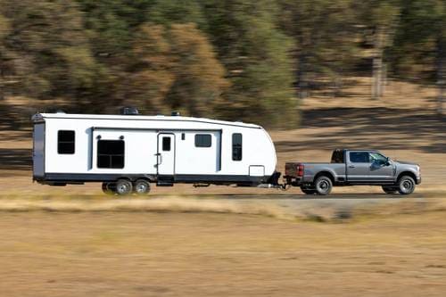 Ford F-250 Super Duty Lariat Crew Cab Pickup Lifestyle Exterior. Tremor Off-Road Package Shown.