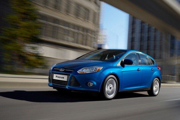 "The pendulum is swinging back" to brighter colors, says Susan Lampinen, Ford's group chief designer for color and material. An example is a Blue Candy 2014 Ford Focus.