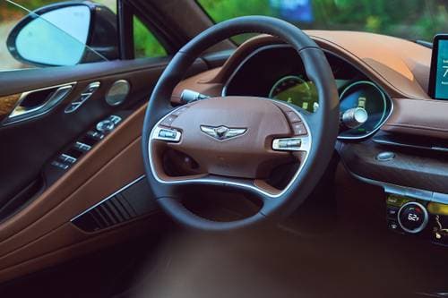 2023 Genesis Electrified G80 Sedan Steering Wheel Detail