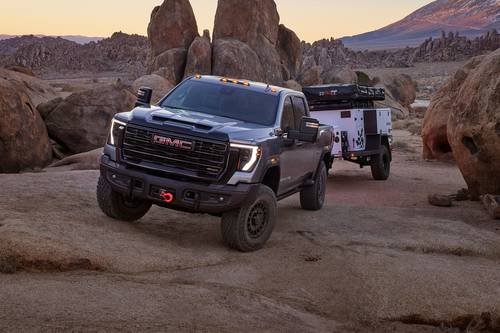 2025 GMC Sierra 2500HD AT4X Crew Cab Pickup Lifestyle Exterior. AEV Edition Shown.