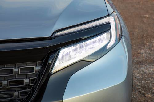 Honda Passport Elite 4dr SUV Headlamp Detail