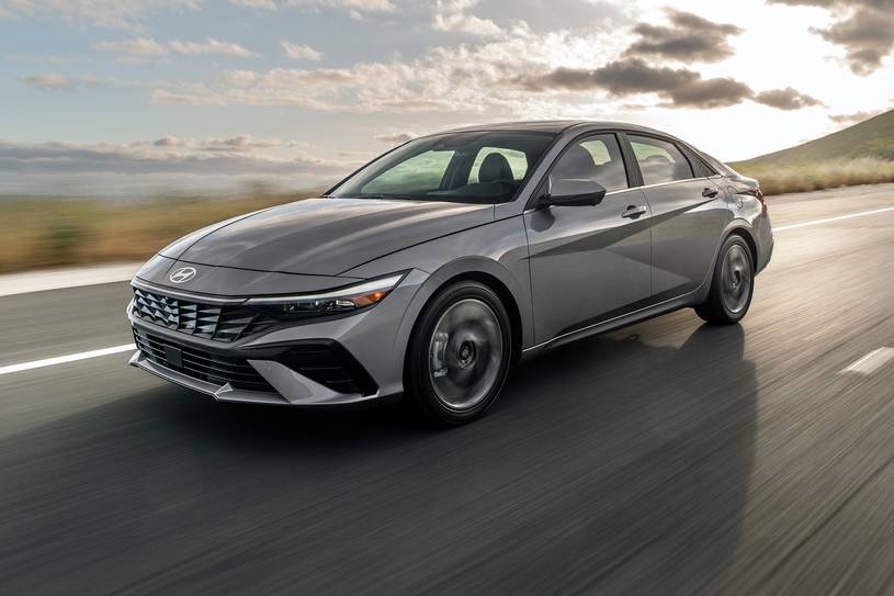 2026 Hyundai Elantra Limited sedan in a studio setting, showcasing its sleek design and modern styling cues.
