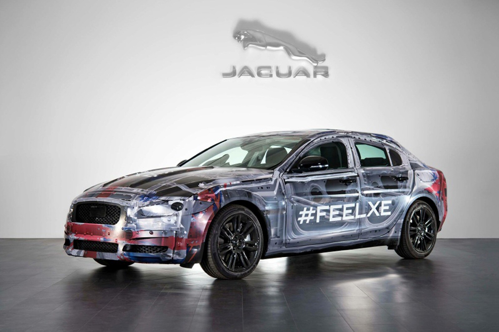 2016 Jaguar Xe Teased Ahead Of 2014 Paris Auto Show Edmunds