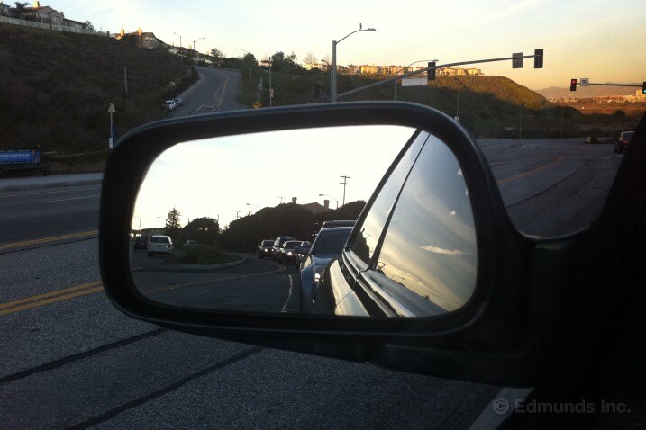 We took this picture to riff on how small the mirrors are in our 1996 Lexus ES 300. But now it seems a fitting farewell photo as the car leaves our fleet.