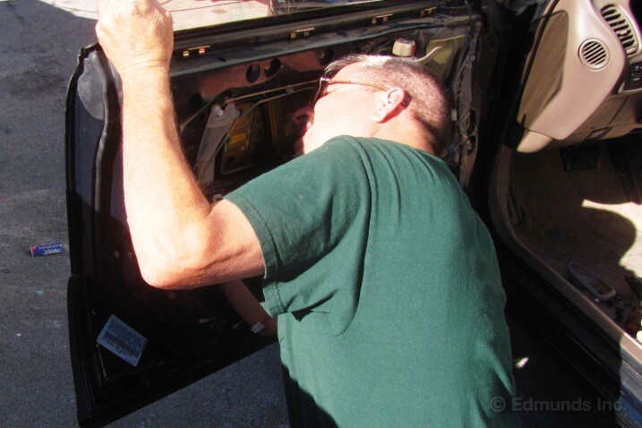 The Lexus's the driver's side door wouldn't open from the outside and there was a nasty rattle inside the door panel. No DIY here. We took the car to a body shop.
