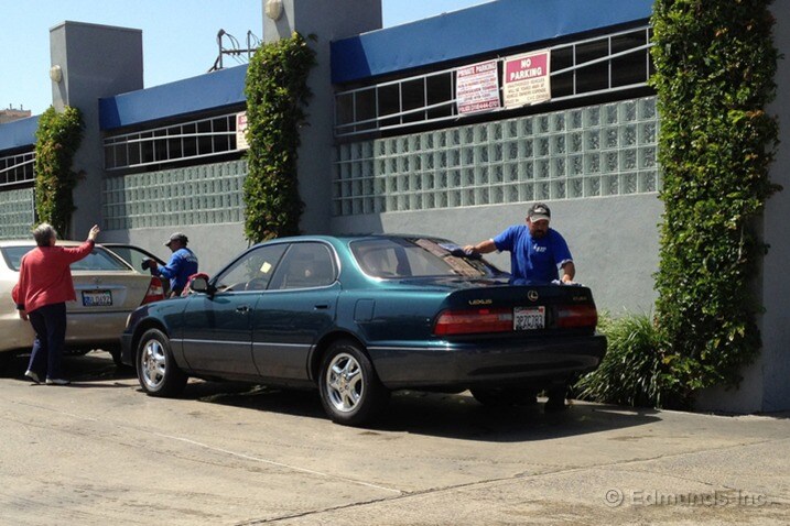 The Lexus cleans up nicely, its chrome wheels and Gold Package lighting up our local car wash.