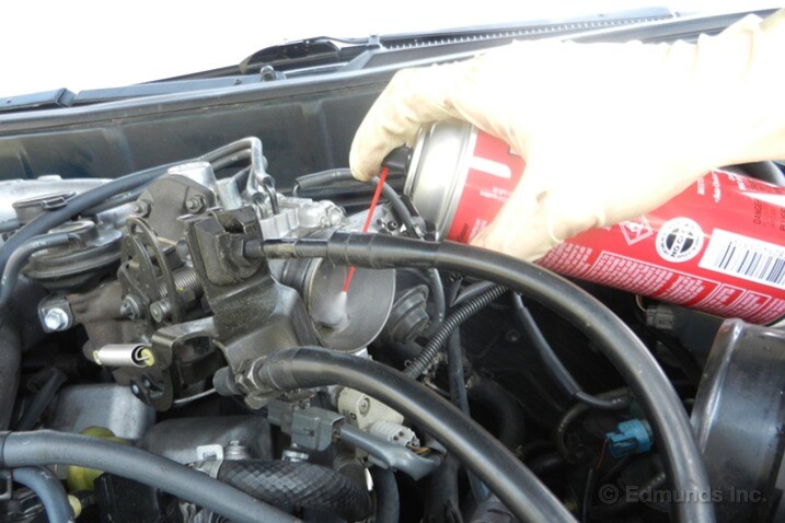 To deal with a possible idle air control valve, we sprayed the small opening in the throttle body as a video had instructed. Alas, it didn't fix the problem.