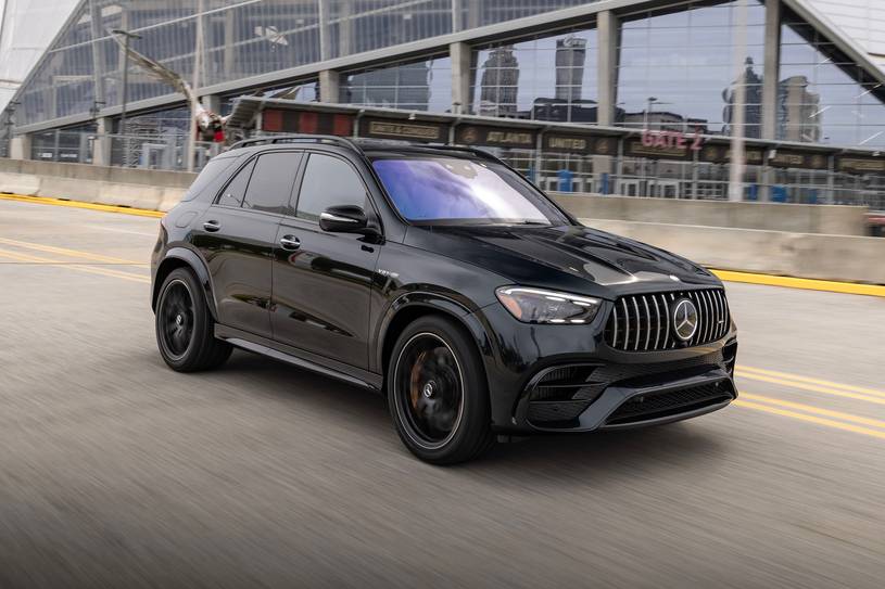 2026 Mercedes-Benz GLE AMG GLE 63 S in an illuminated outdoor setting, showcasing performance SUV styling.
