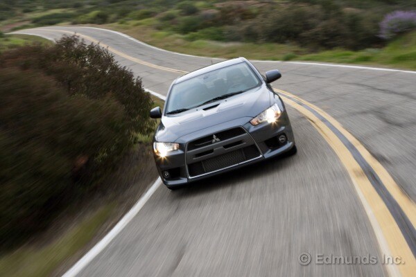 2010 BMW 335i vs. 2010 Mitsubishi Lancer Evolution MR Touring