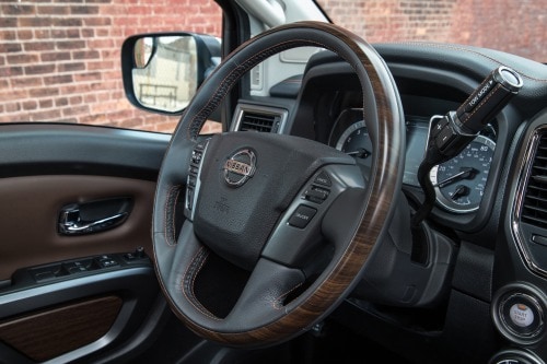 2017 Nissan Titan Platinum Reserve Crew Cab Pickup Steering Wheel Detail