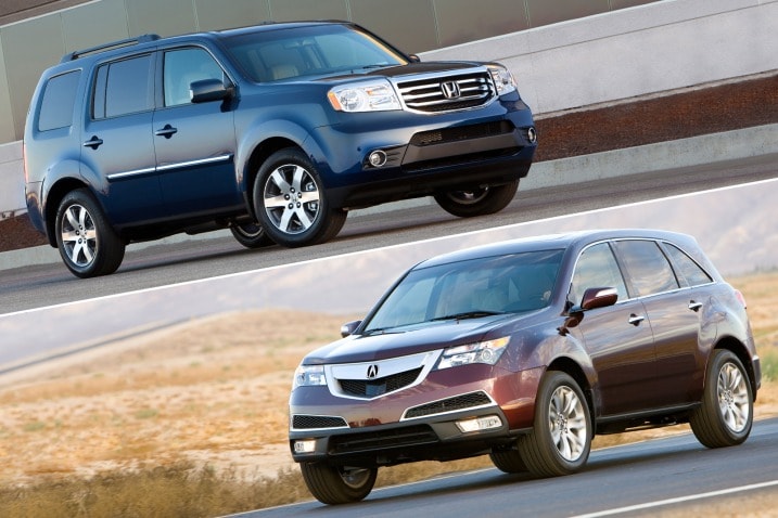 The non-luxury Honda Pilot SUV and its luxury cousin, the Acura MDX.