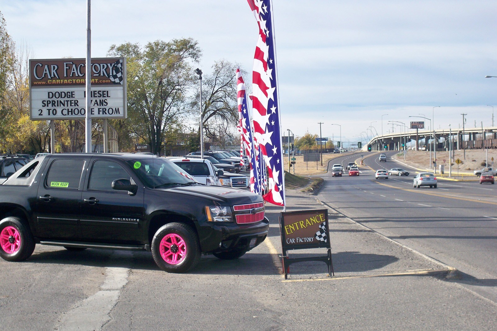 An Evolving Parade of Flags Helps the Car Factory Dealership Stand Out