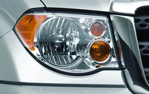 2012 Suzuki Equator Sport Extended Cab Headlamp Detail