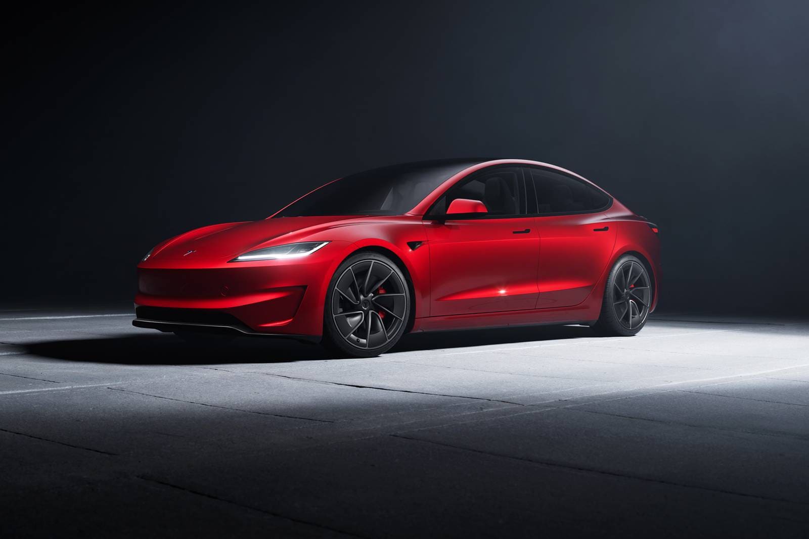 https://media.ed.edmunds-media.com/tesla/model-3/2026/oem/2026_tesla_model-3_sedan_performance_fq_oem_3_1600.jpg